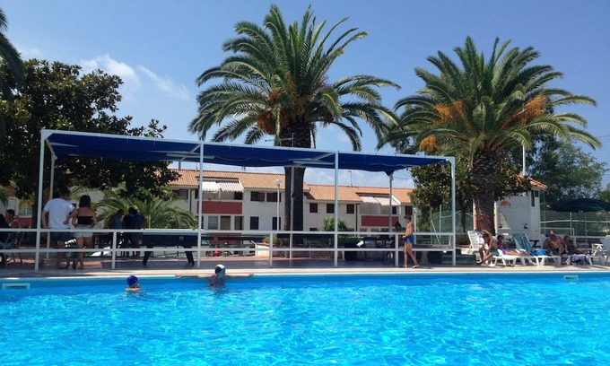 Falerna Apartment | Holiday Apartment "Trilocale 83 Residence La Giungla" with Sea View, Shared Pool & Wi-Fi