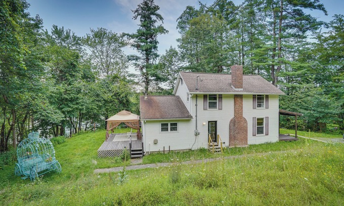West Sand Lake House | Lakefront West Sand Lake Home with Beach Access!
